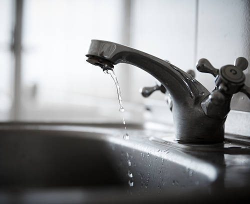 dirty bathroom faucet